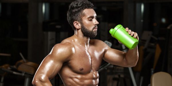 Man drinking pre-workout